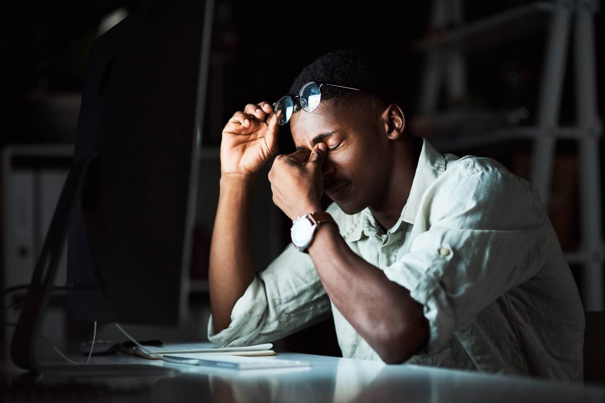 Man suffering from dry eye symptoms